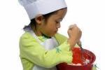 Young Chef Stirring a Bowl